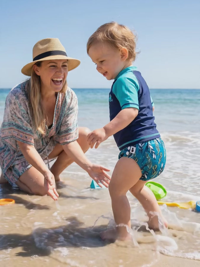 Swim nappy at the beach with mum (video)